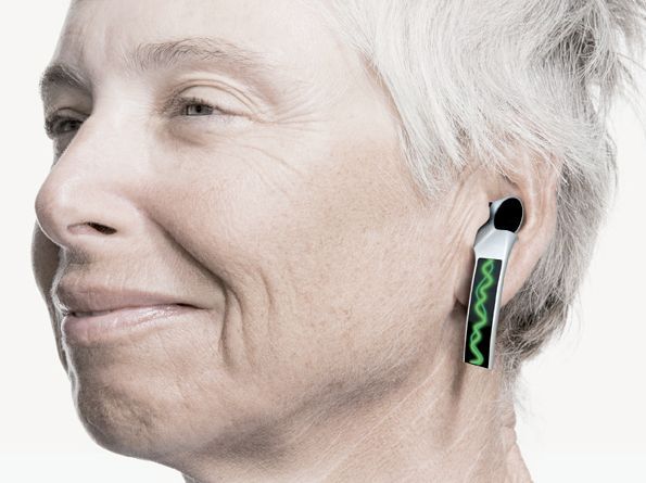Woman wearing a futuristic-looking hearing aid