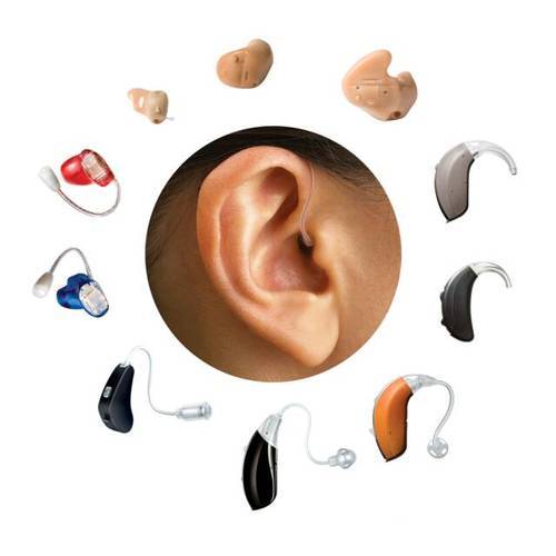 Ear surrounded by a variety of hearing aids
