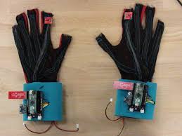 SignAloud Gloves - black gloves with micro processors on the wrists